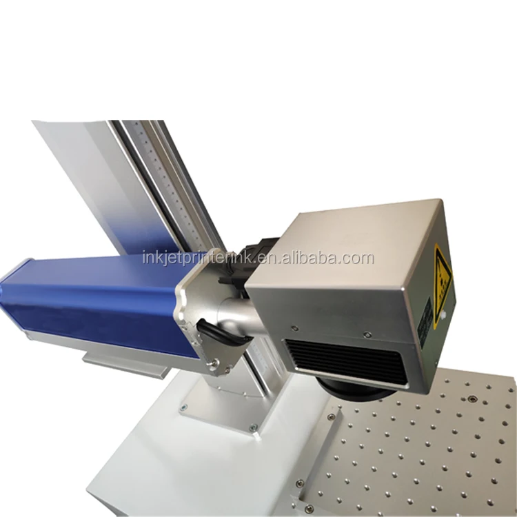 
sheet metal plastic labeling paper laser printing machine on baby pacifier 