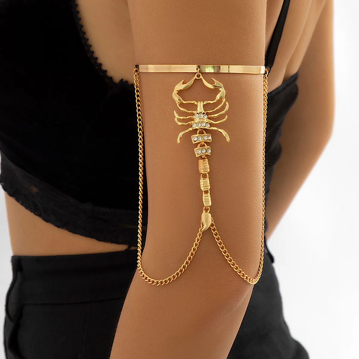 Metallic chain-tassel arm chain with dark LACES for small open snake-and-scorpion bracelet arm rings