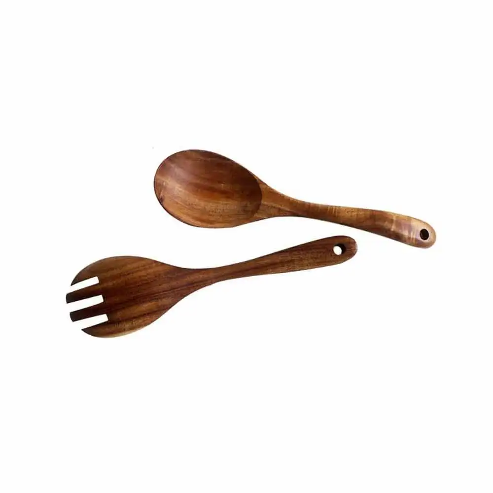 Инструменты для салата. Современный набор деревянных салатников содержит ложки и вилки