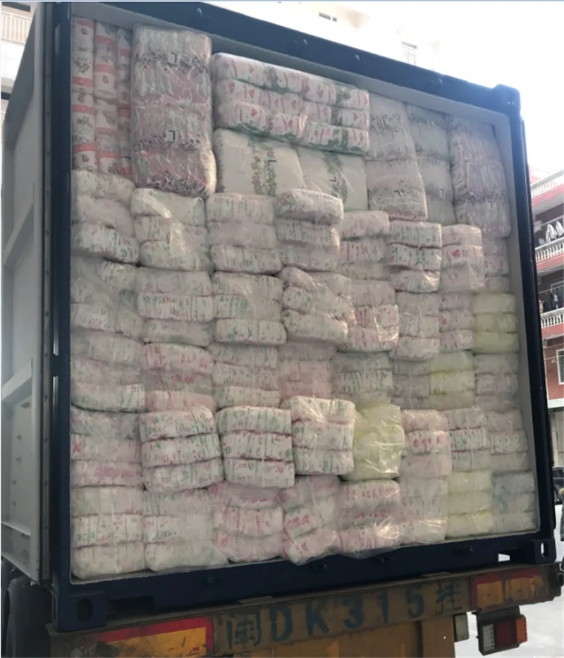 Дешевые цены Quanzhou оптом OEM Stocklots B класс одноразовые детские подгузники в тюках/оптом