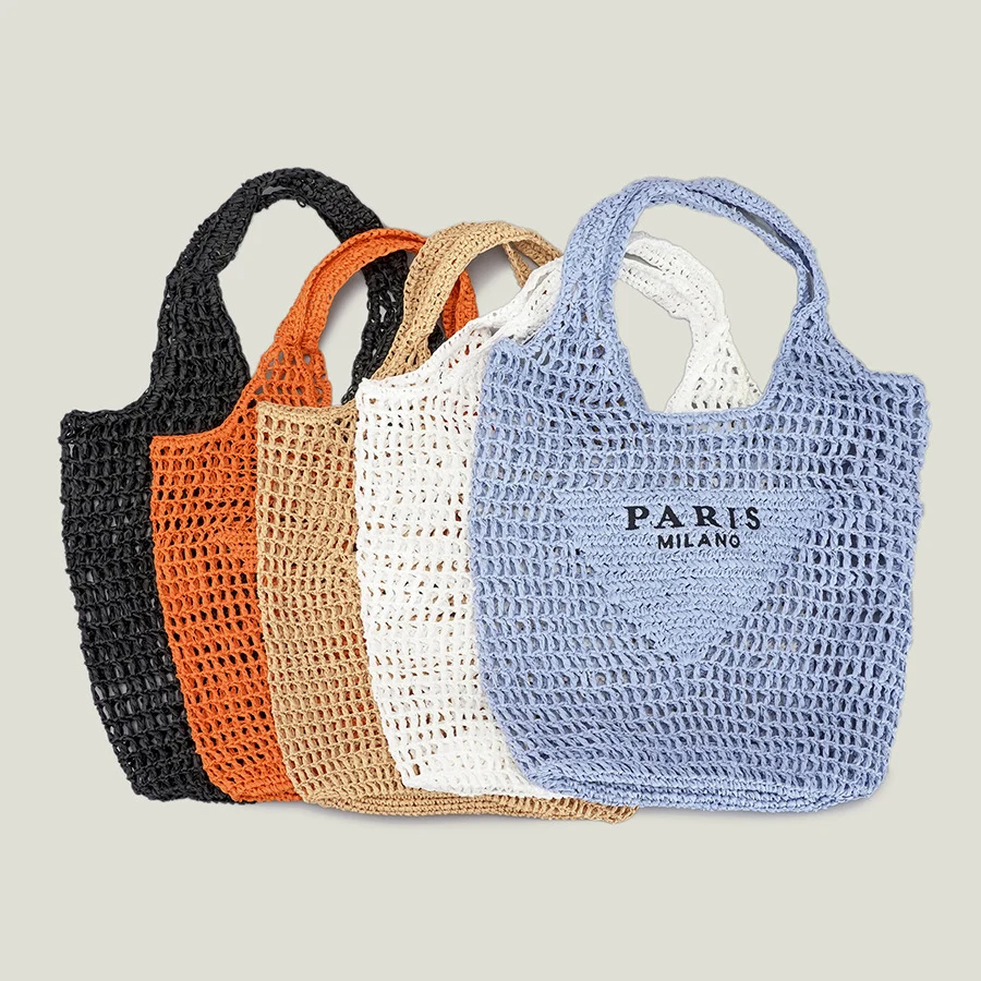 2023 Hand-woven fashion hollow out handbag custom summer mesh straw tote bag paper straw beach bag for women