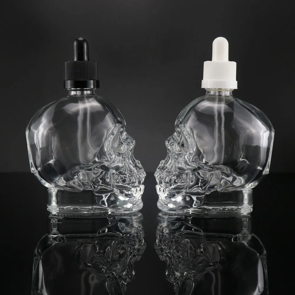 Unique Design Empty 15ml 30ml 100ml Skull Glass Perfume Diffuser Bottle With Spray Cap