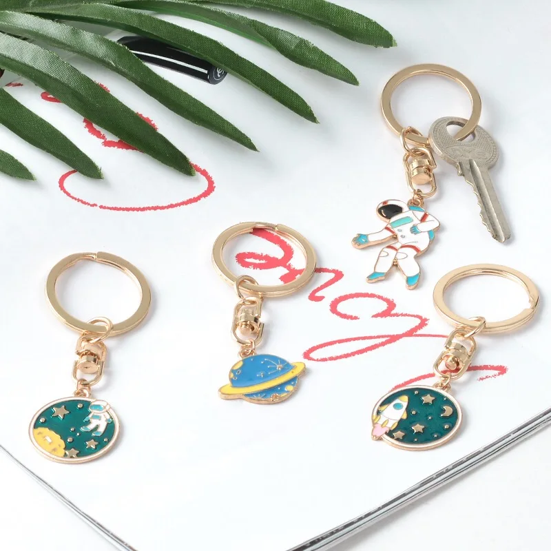 4 Styles Escape from the earth ! UFO Space Craft Astronaut Rocket Planet Spaceman Universe Star Key Ring KeyChain For astrophile