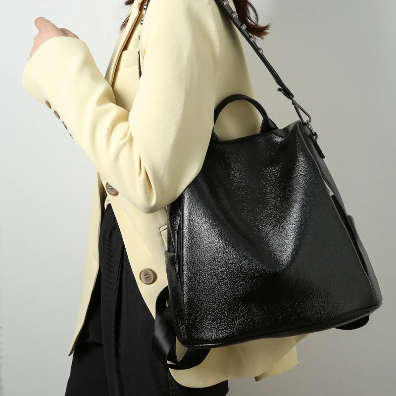 high quality soft PU leather wholesale young teenager casual backpack large capacity solid color backpack with rivet decoration