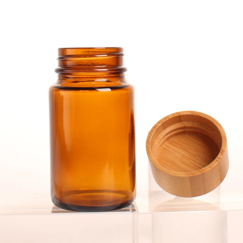 100cc New Launched 100ml Amber Color Glass Jar with Bamboo Lid Top with Your Own Engraving Logo and Label