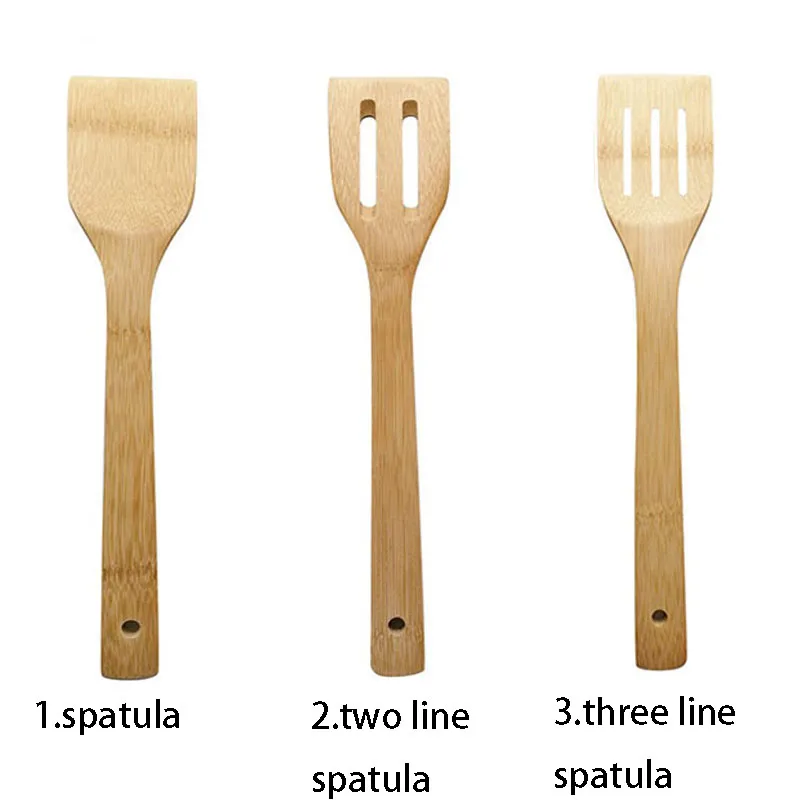 Bamboo spatula in stocked kitchen gadgets for cooking