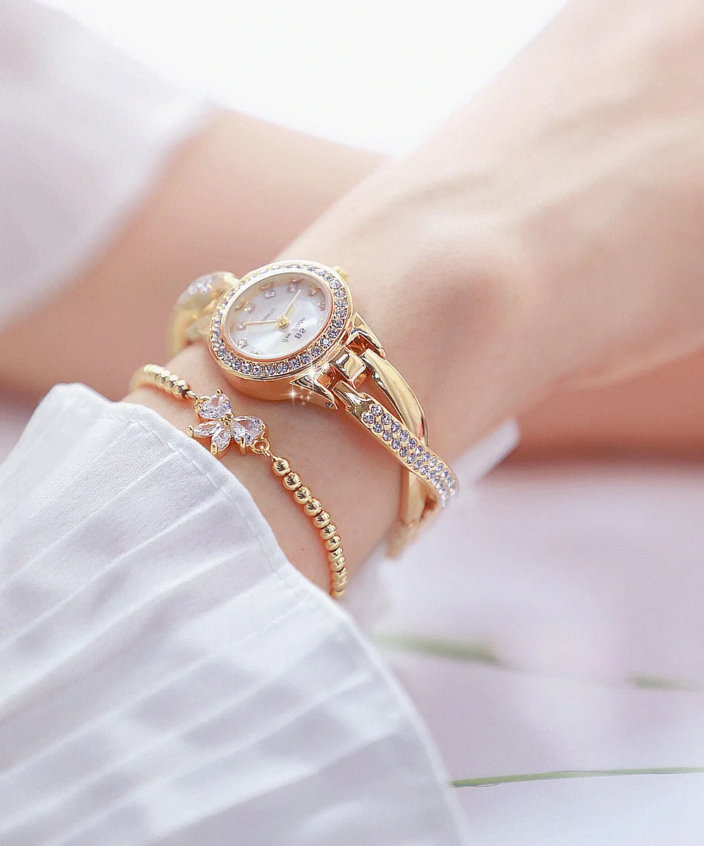 Ladies fashion new gold luxury quartz wrist watches full diamond rhinestone women charm digital watches for girl wholesale