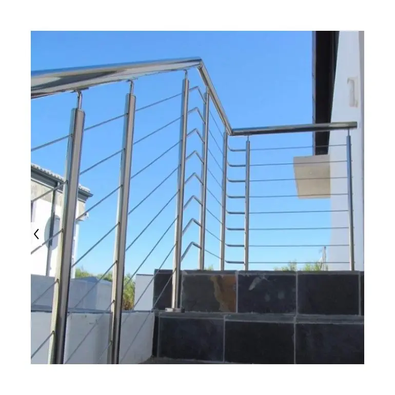 Vertical deck cable railing system with Round Stainless steel posts and Handrail