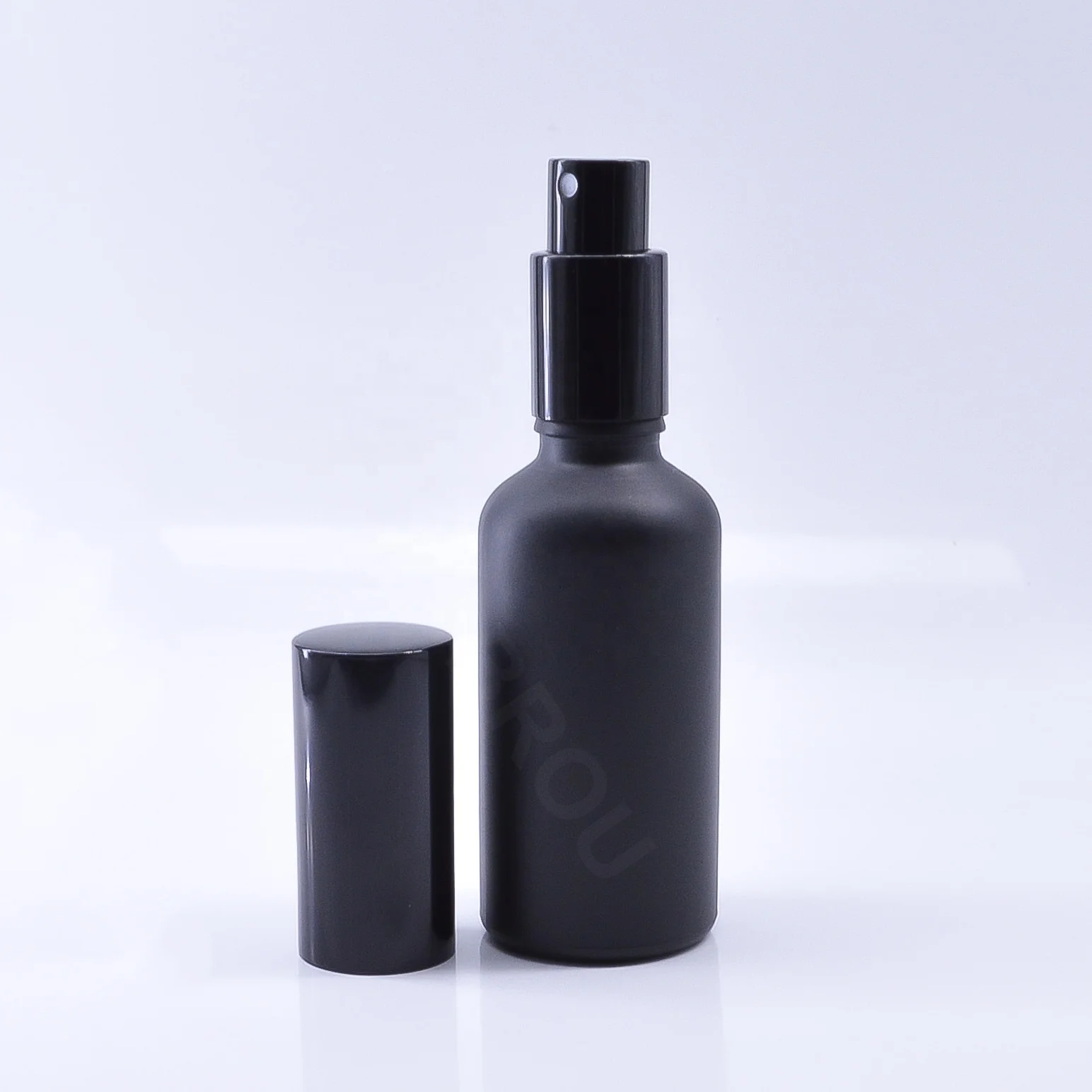 Cosmetic round matte black 30 50 100ml fragrance oil glass perfume bottle with spray pump cap