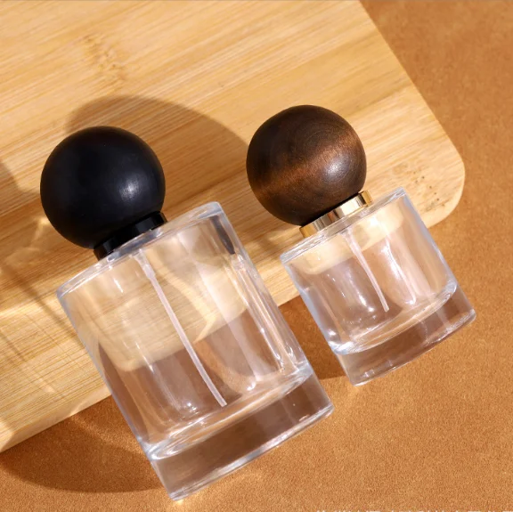 30/50/100ml Clear Glass Perfume Bottle Aroma Fragrance Pump Spray Empty Cylinder Glass Bottle With Cute Wood Ball Shape Cap