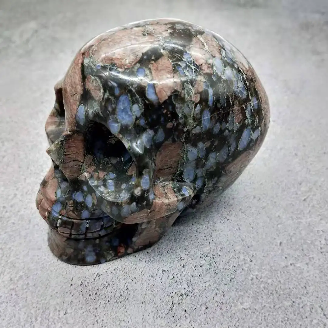 wholesale crystal skulls top quality hand carving human llanite skulls crystal crafts for fengshui decoration