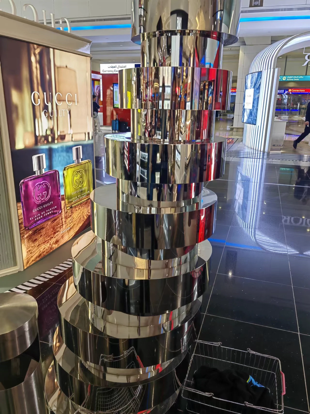 large modern dubai airport stainless steel tree statue metal decor craft shopping mall window display public art sculpture