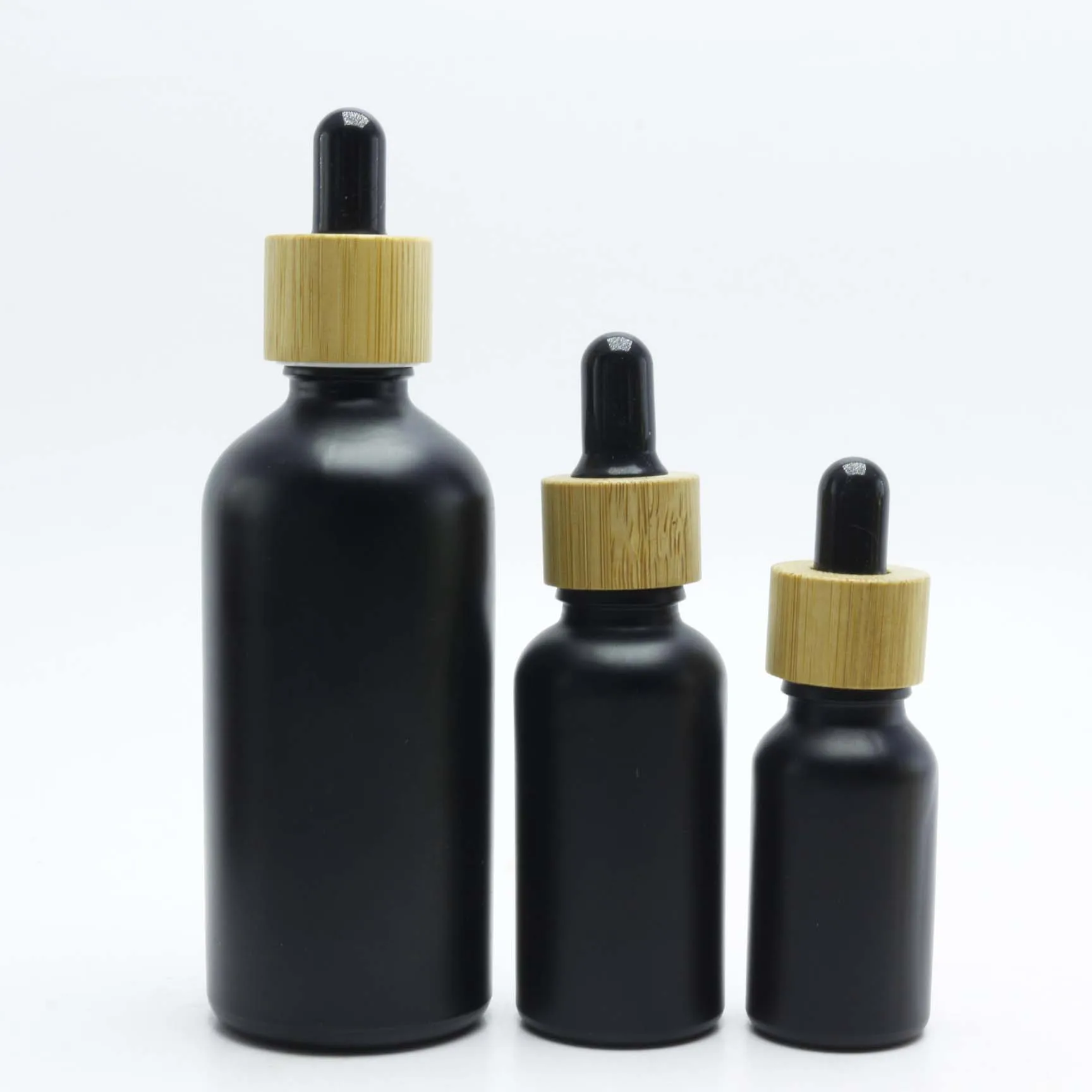 Best selling 30ml black frosted cosmetic bottle essential oil bottle with measurement pipette and paper tube packaging GB-AN35