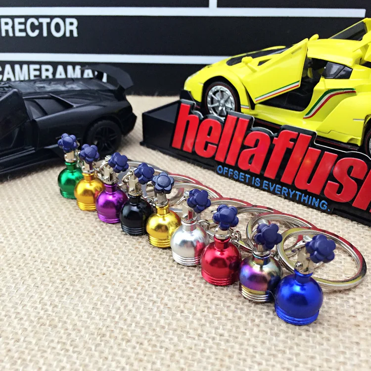 Hot selling nitrogen bottle keychain can be customized creative metal turbo cartoon NOS auto parts metal keychain