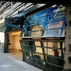 China Electric Automatic Doors Industrial Sectional Bi Fold Glass Garage Door