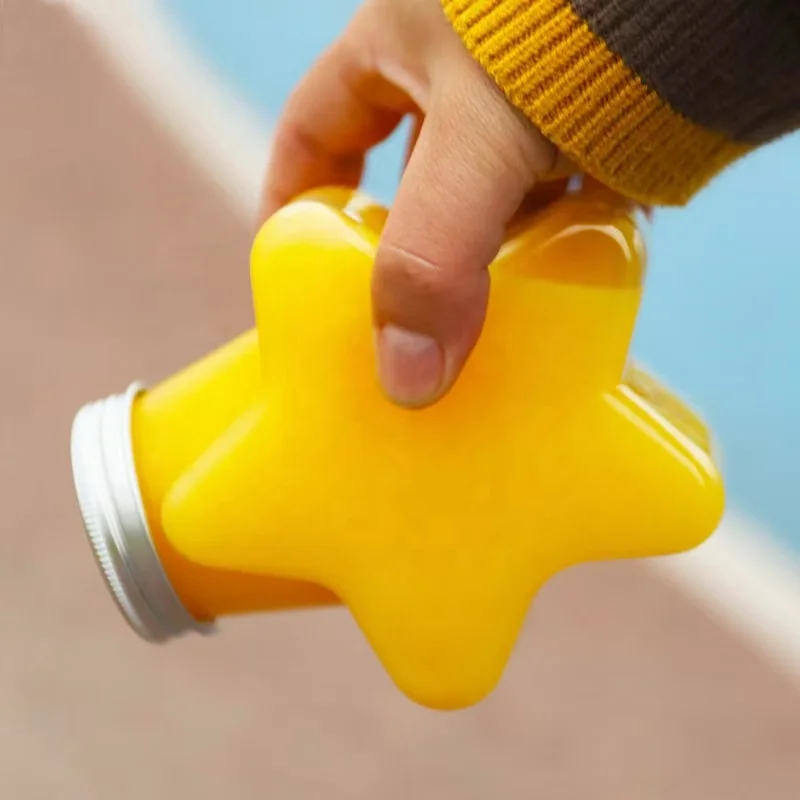 factory wholesale beautiful 200ml 500ml plastic star shape empty bottle with lid for beverage