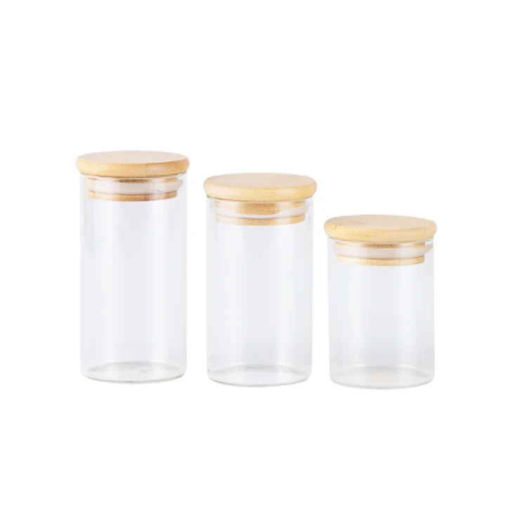 Wholesale kitchen round clear storage bottles high borosilicate glass jar wooden lid