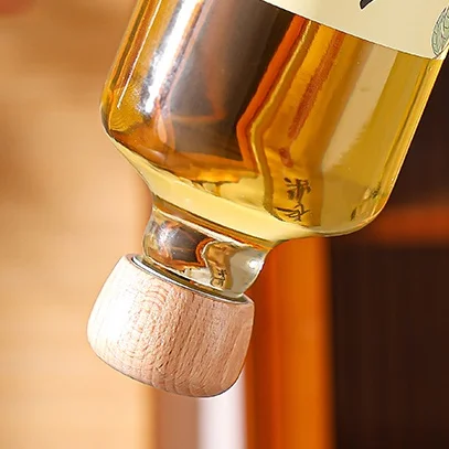 Top-ranking Products 500ml 700ml Transparent Round Glass Liquor Wine Vodka Tequila Bottle With Sealed Cork