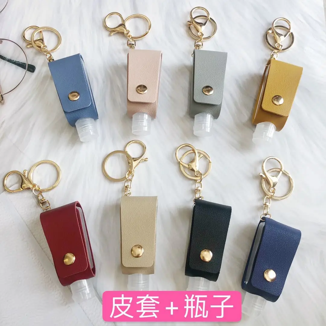Xinxing New Empty sanitizer bottles  Keychain Holder Reusable Lotion Squeeze Tube Soap Containers Leather Pouches Accessories