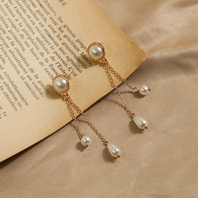 Stock lot South Korea Dongdaemun fashion style long tassel water drop pearl 925 silver needle earrings female