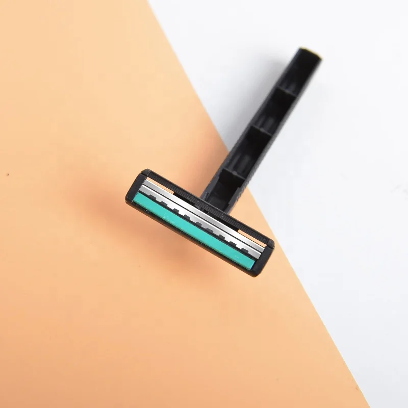 Cheap razor is black color plastic handle and shaving blades stainless steel shaver on blade.