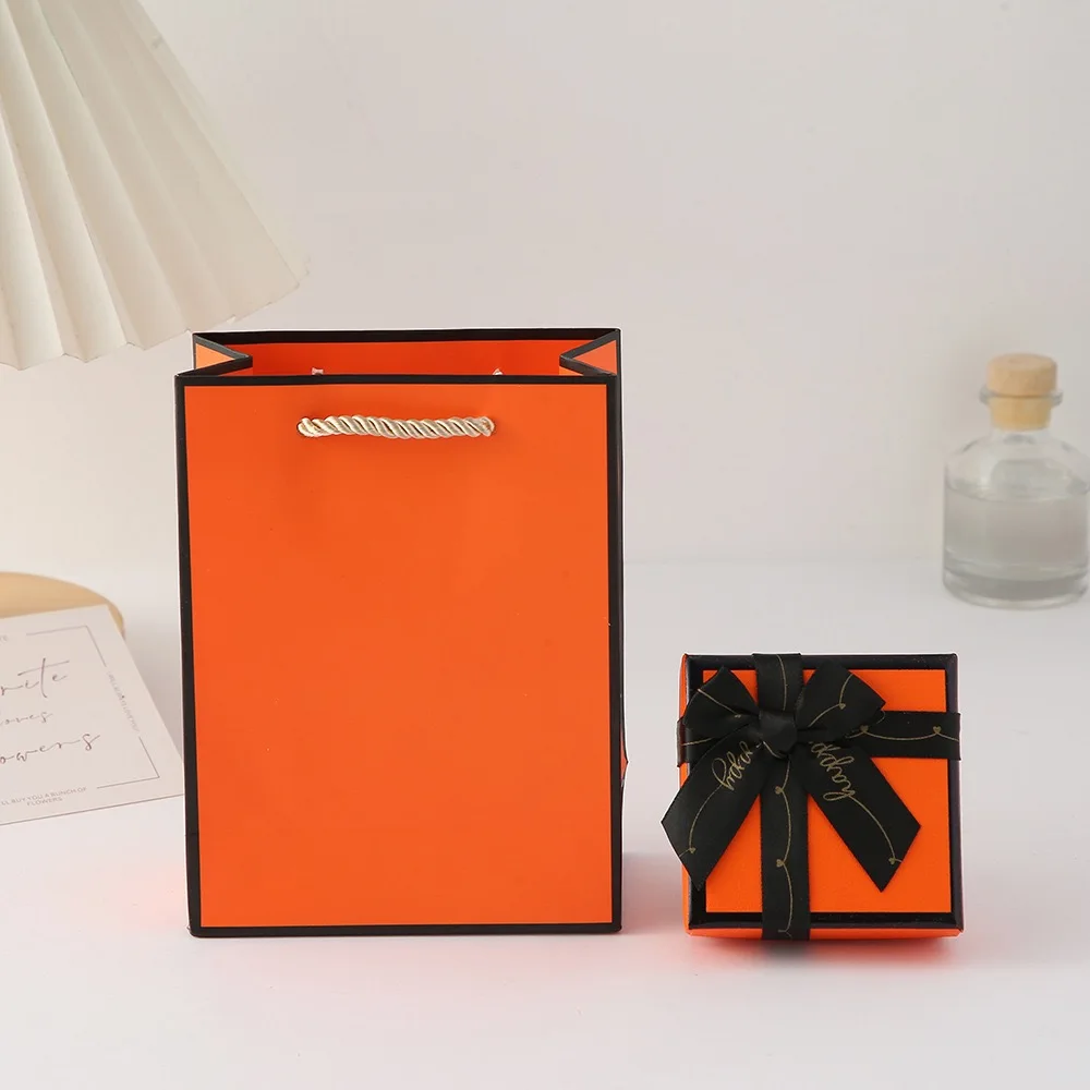 Hot Sale Wholesale Luxury Custom logo Paper Packaging Gift Jewelry Box with Bow and Bag