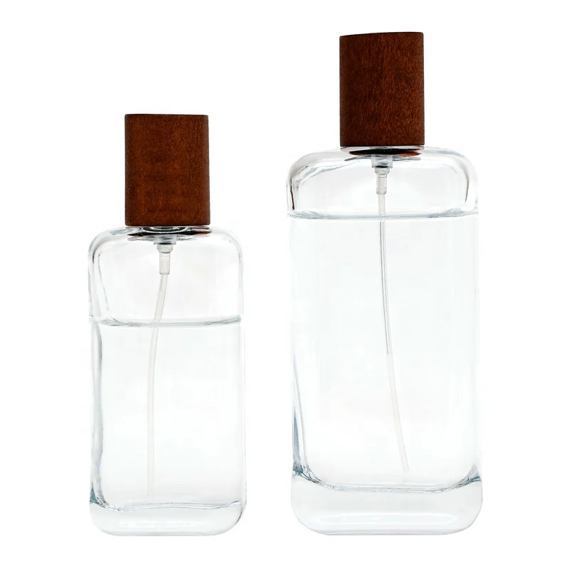Custom 25ml 50ml 100ml clear glass spray pump perfume bottle with wooden cap
