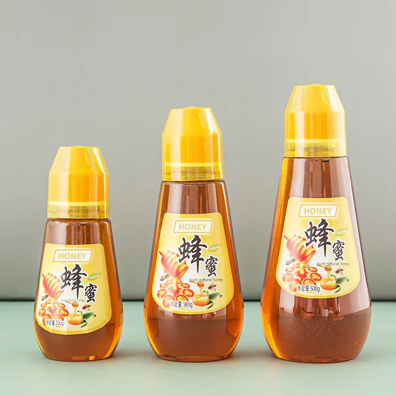 Custom Size Honeycomb Honey Bottles Food Grade PET Plastic Honey Bottles Gift Creative Squeeze Bottle for Honey