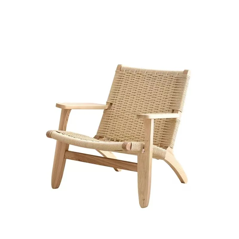 Designers all over the world pursue Nordic rattan saddle chair solid wood back lounge chair