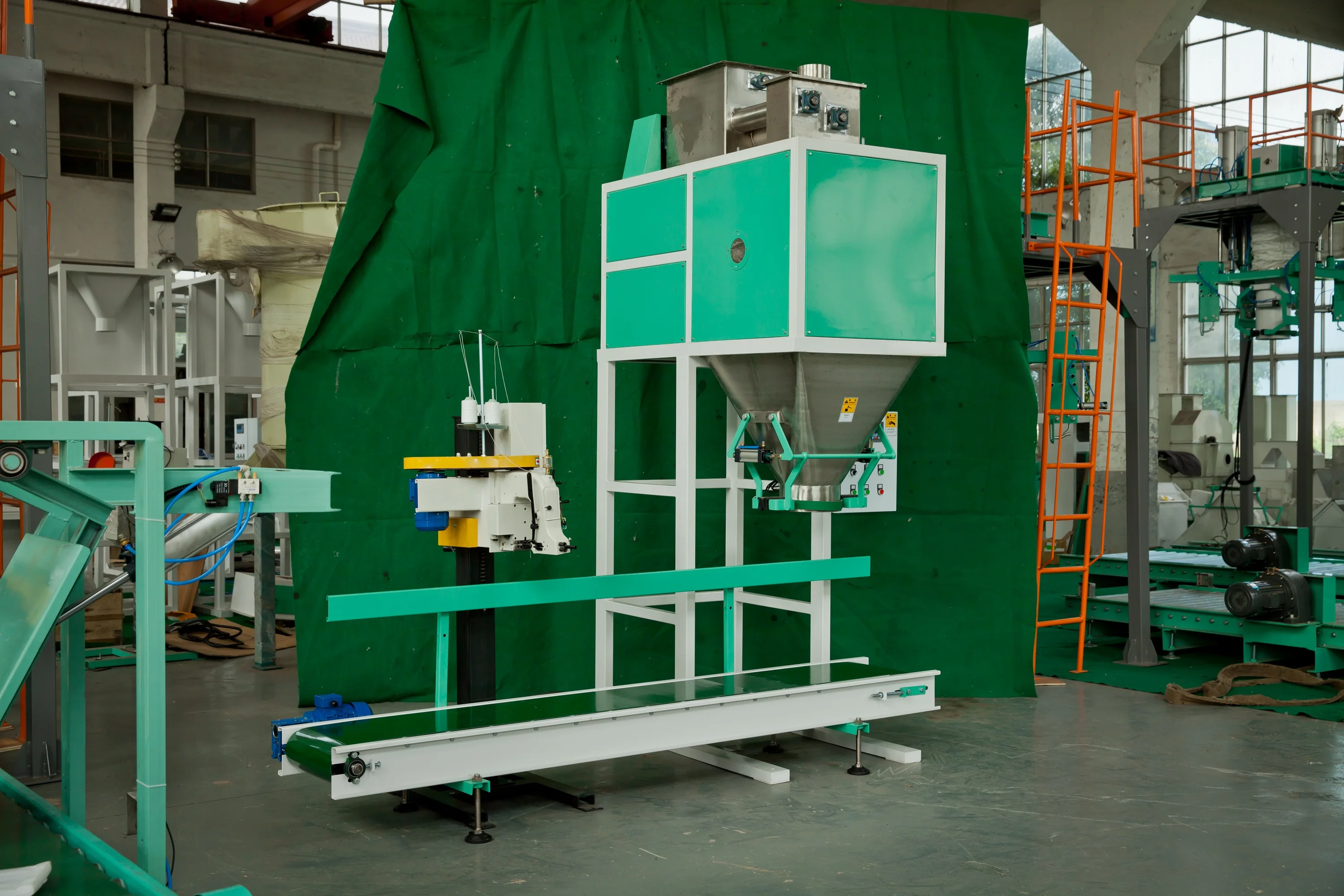 Bag infeed system Tag dispenser Sewing line with synchronized bag top chain conveyor premade tag application device