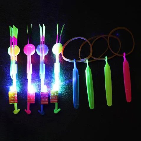 Kids Classic Toy Magic Plastic Light Glowing Rocket Slingshot Shooting Flying Led Arrow Helicopter