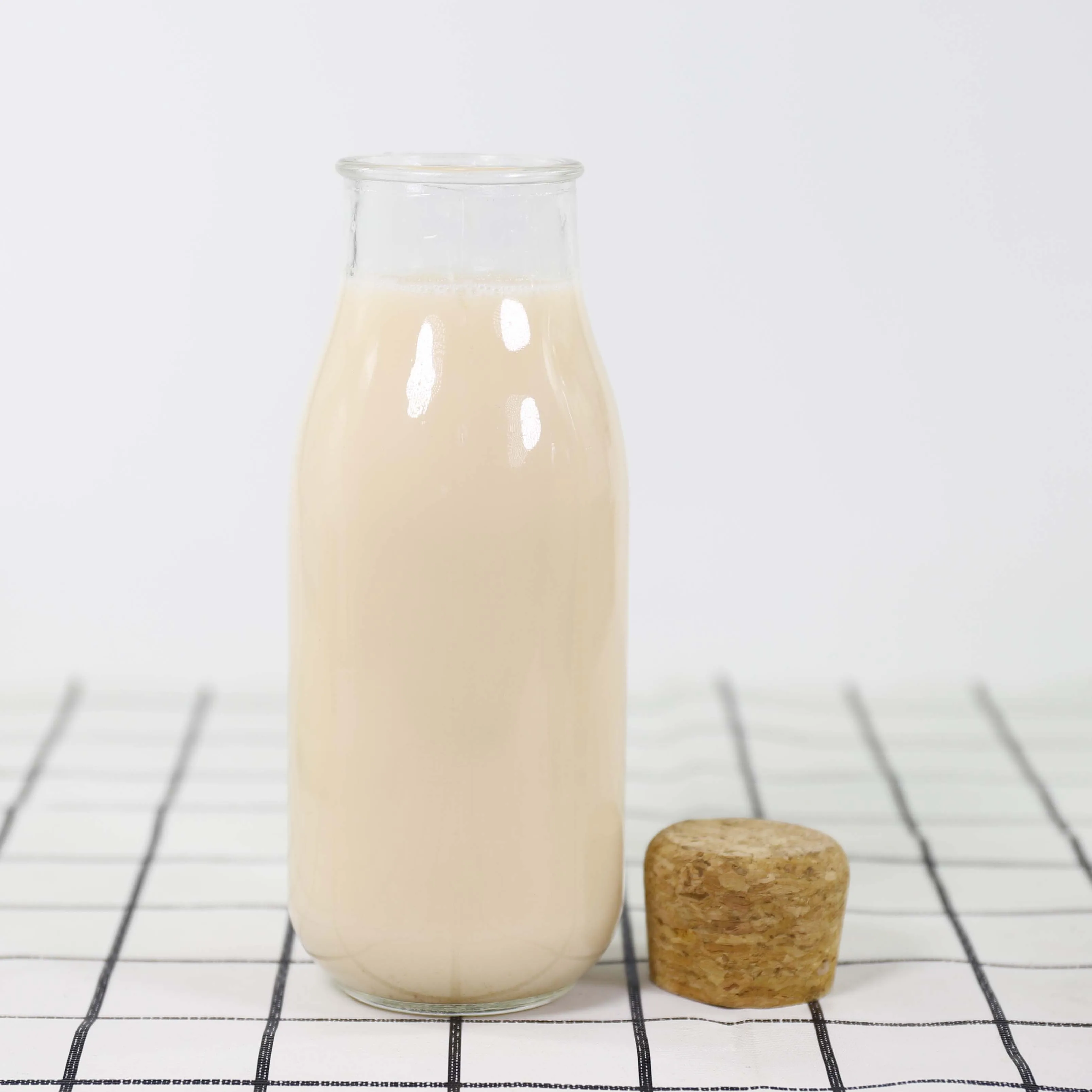 Factory outlet sale recyclable 300ml glass milk bottle with cork
