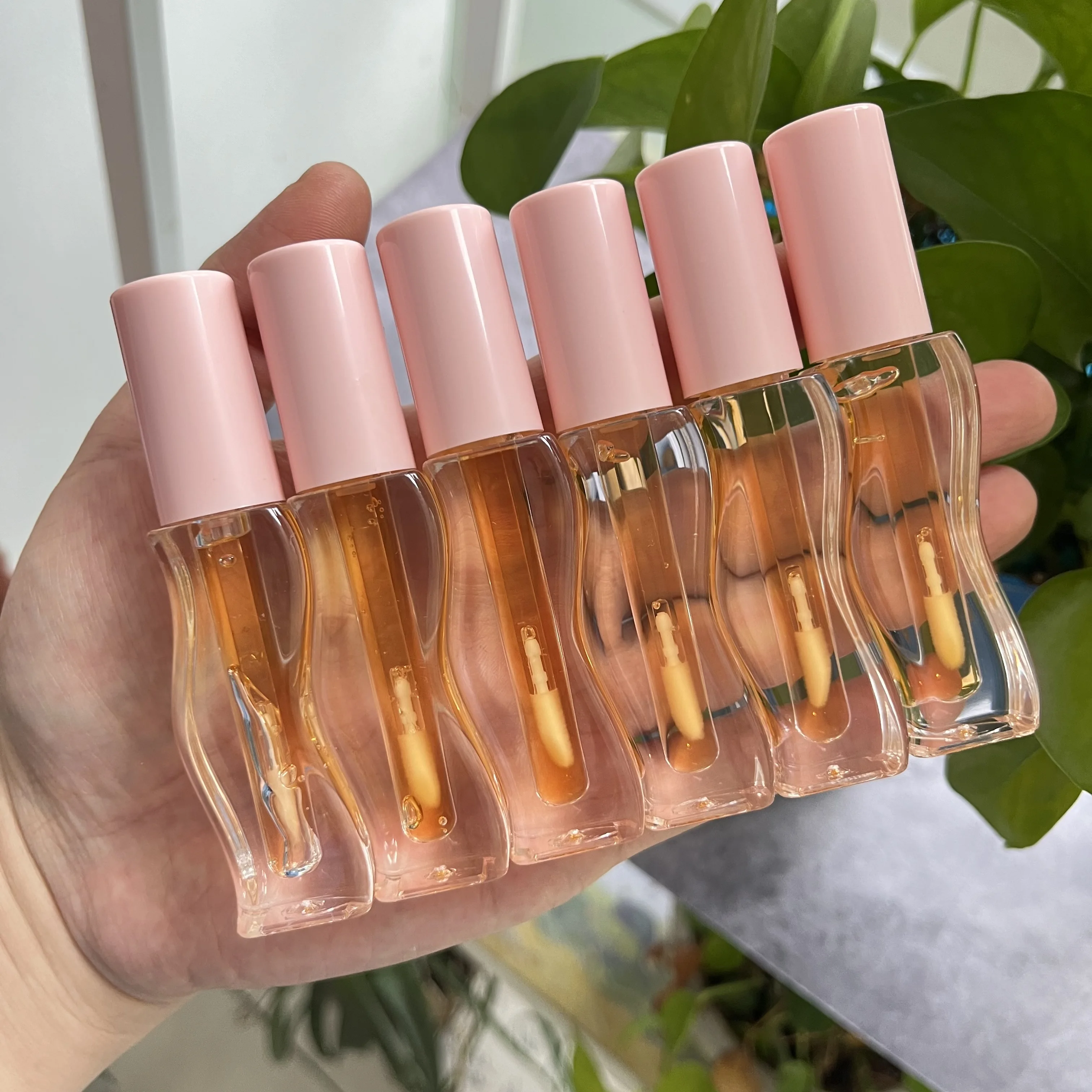 Private label lip plump oil custom packaging glossy honey gold pink fruit tinted lip glow oil