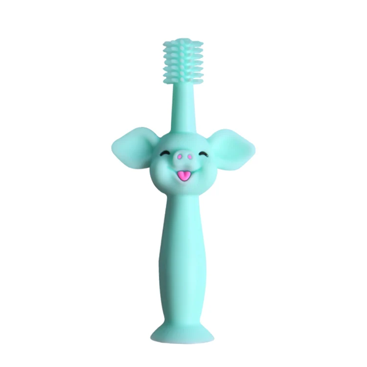 Factory With suction cup grip can be customized baby toothbrush cartoon piggy shape silicone toothbrush baby