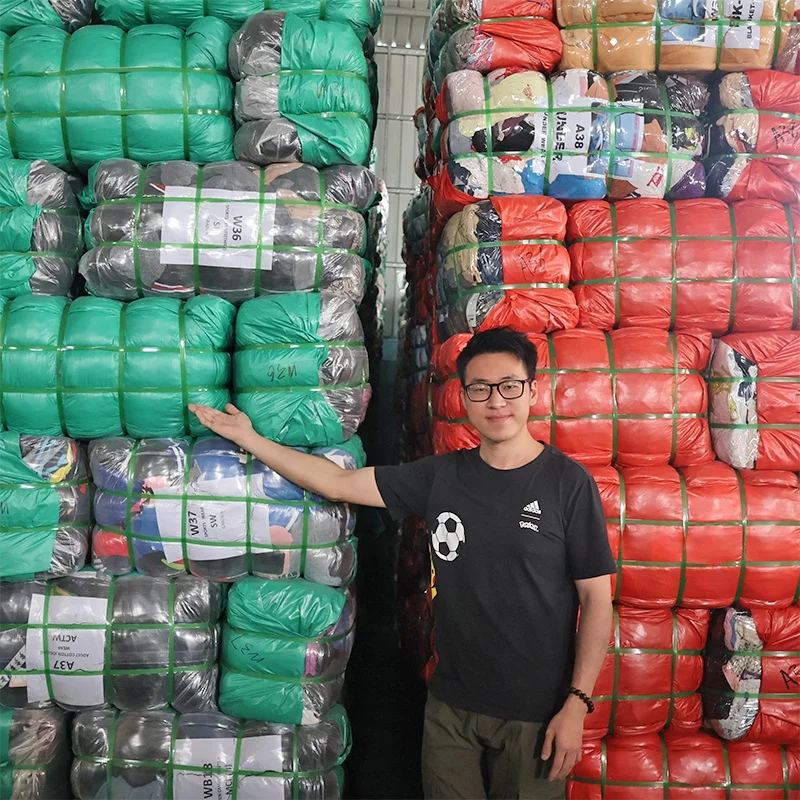 Import Vintage Thrift Store clothes used apparel bales second hand jeans denim trousers pants clothing