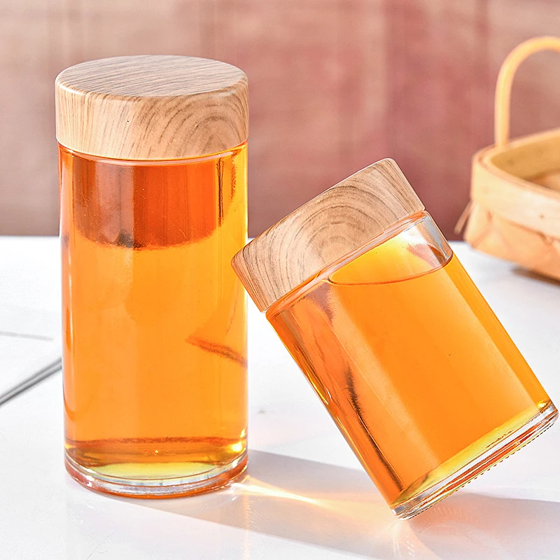 In Bulk Customized Round Glass Jar 180ml 250ml 500ml 750ml Container for Honey Jam Baby Food Storage with Wooden Metal Lid