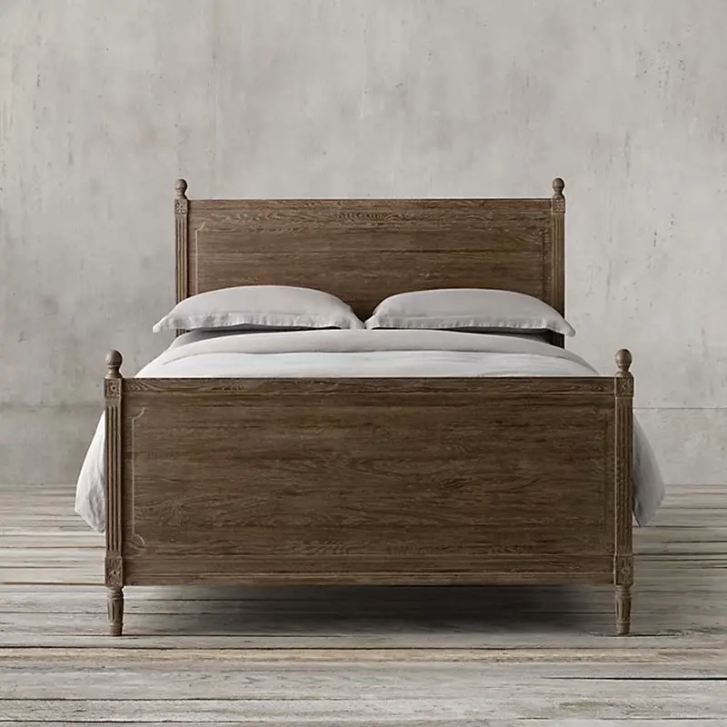 Custom furnished French style bedroom with large solid wood bed