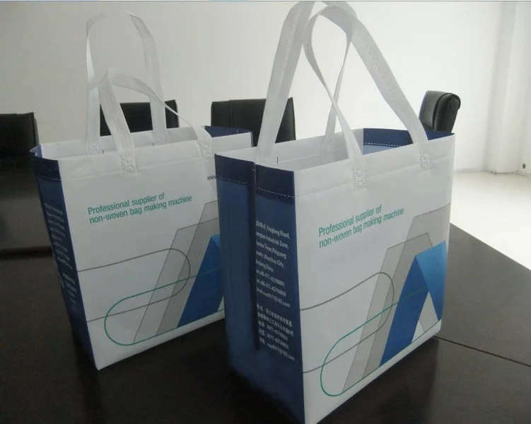 Automatic non woven box type carry bag making machine