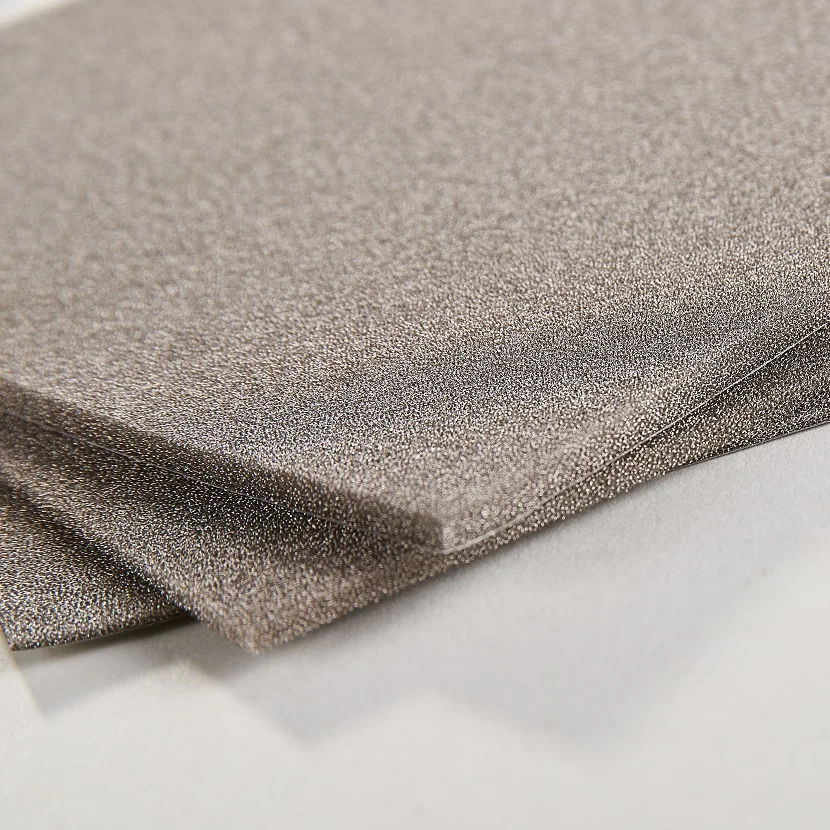 Metallic Conductive Sponge Polymer Composites Z-Foam Gasket Laminated with Adhesive Film Coated Fabric for Accessory Use
