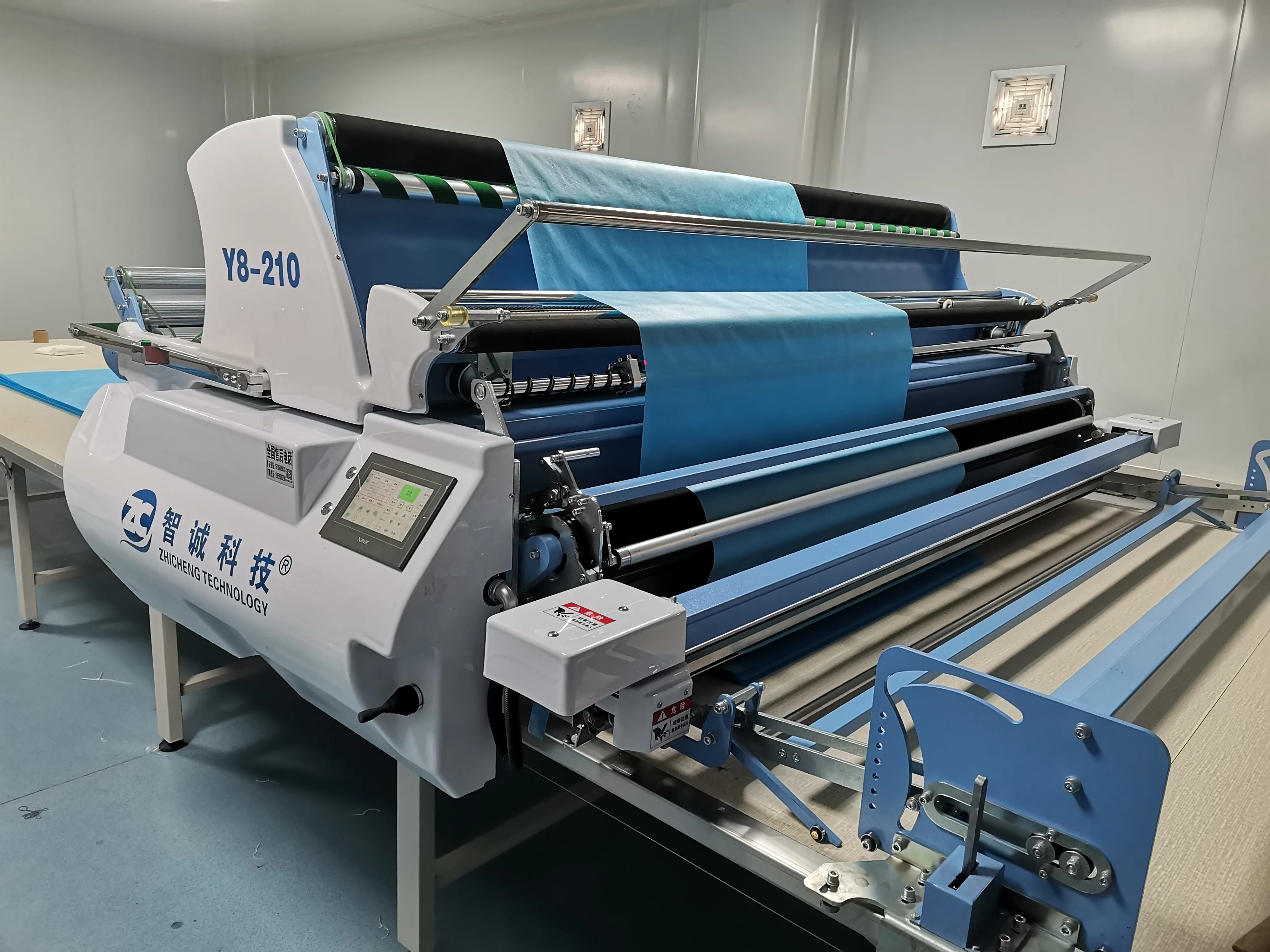 China Wholesale Apparel & Textile Machinery Automatic Fabric Spreader With Full Servo Motor Driving