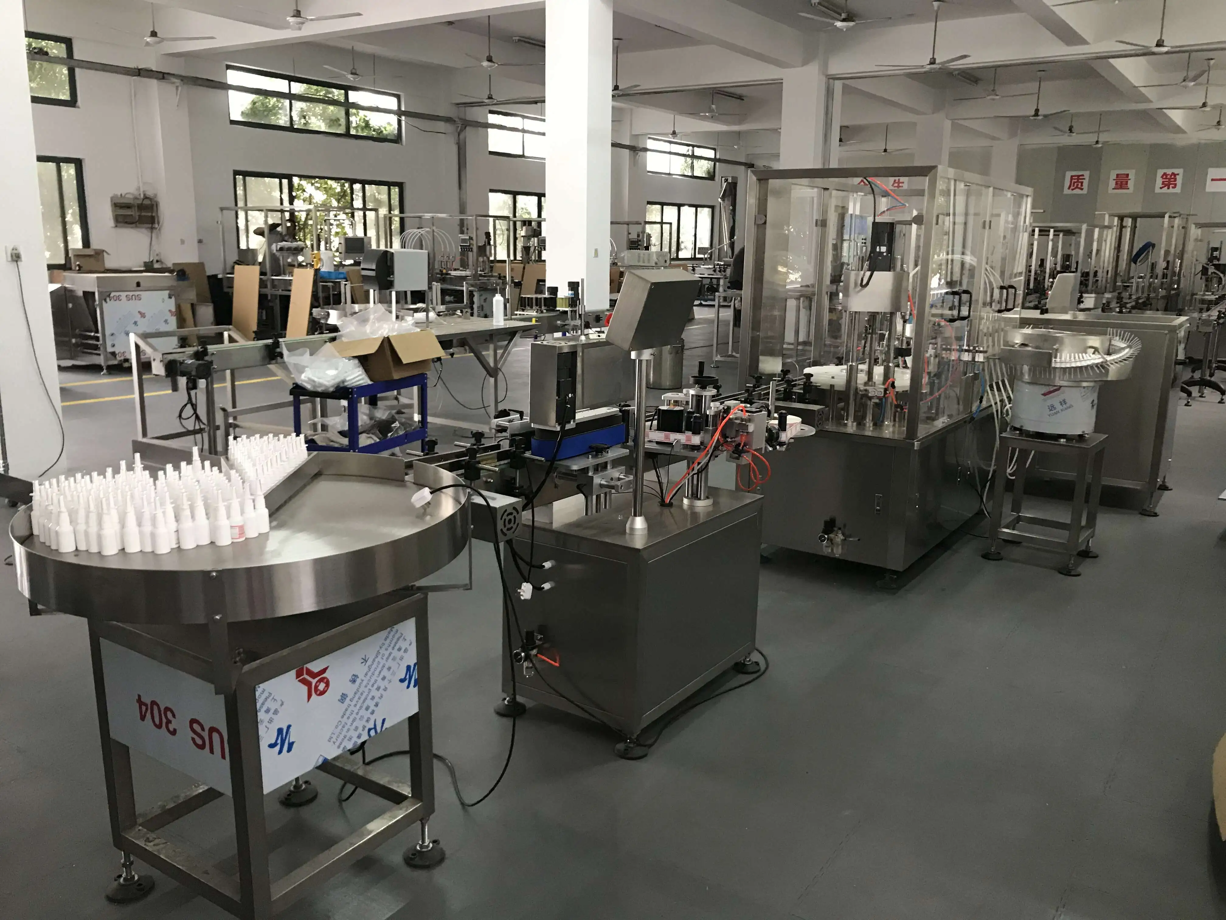 Glass bottle infusion stoppering and capping oral liquid filling line