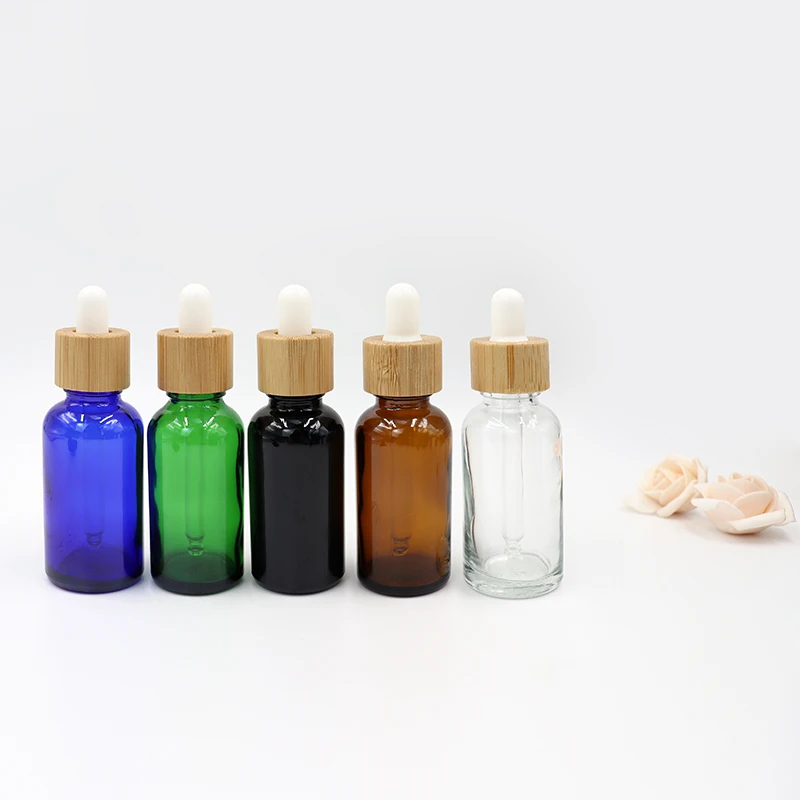High Quality Dropper Bottle Empty Essential Oil for Face Skincare Black Amber Frosted Glass Dropper Bottle with Bamboo lid