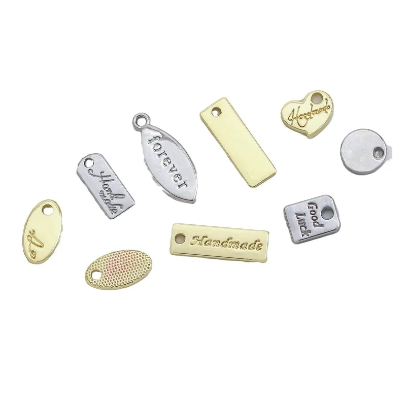 Wholesale Custom Metal Label Decorative Metal Engraved Electroplated Gold Silver Label For Handbag Clothing