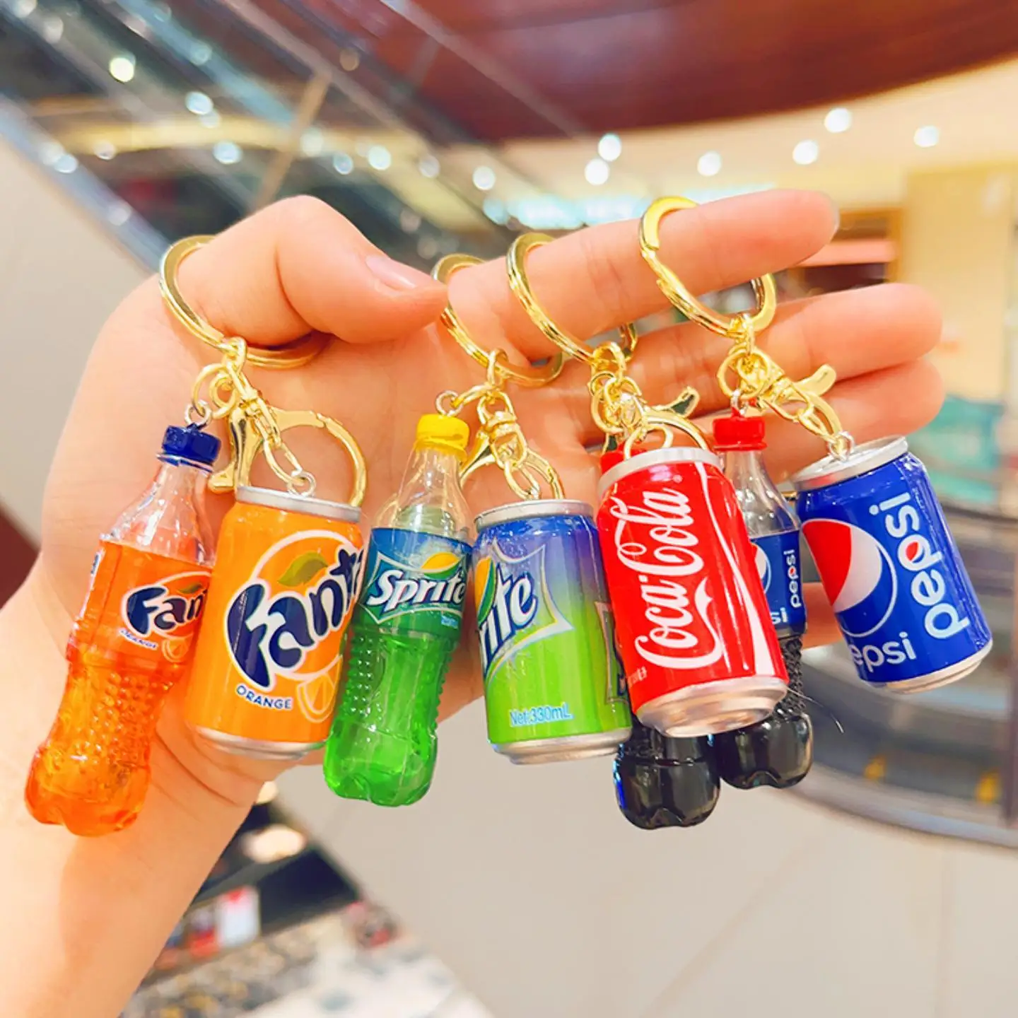 Wholesale cute mini super simulation cola beverage bottles, cans, keychains, couple bags, car pendants, promotional gifts