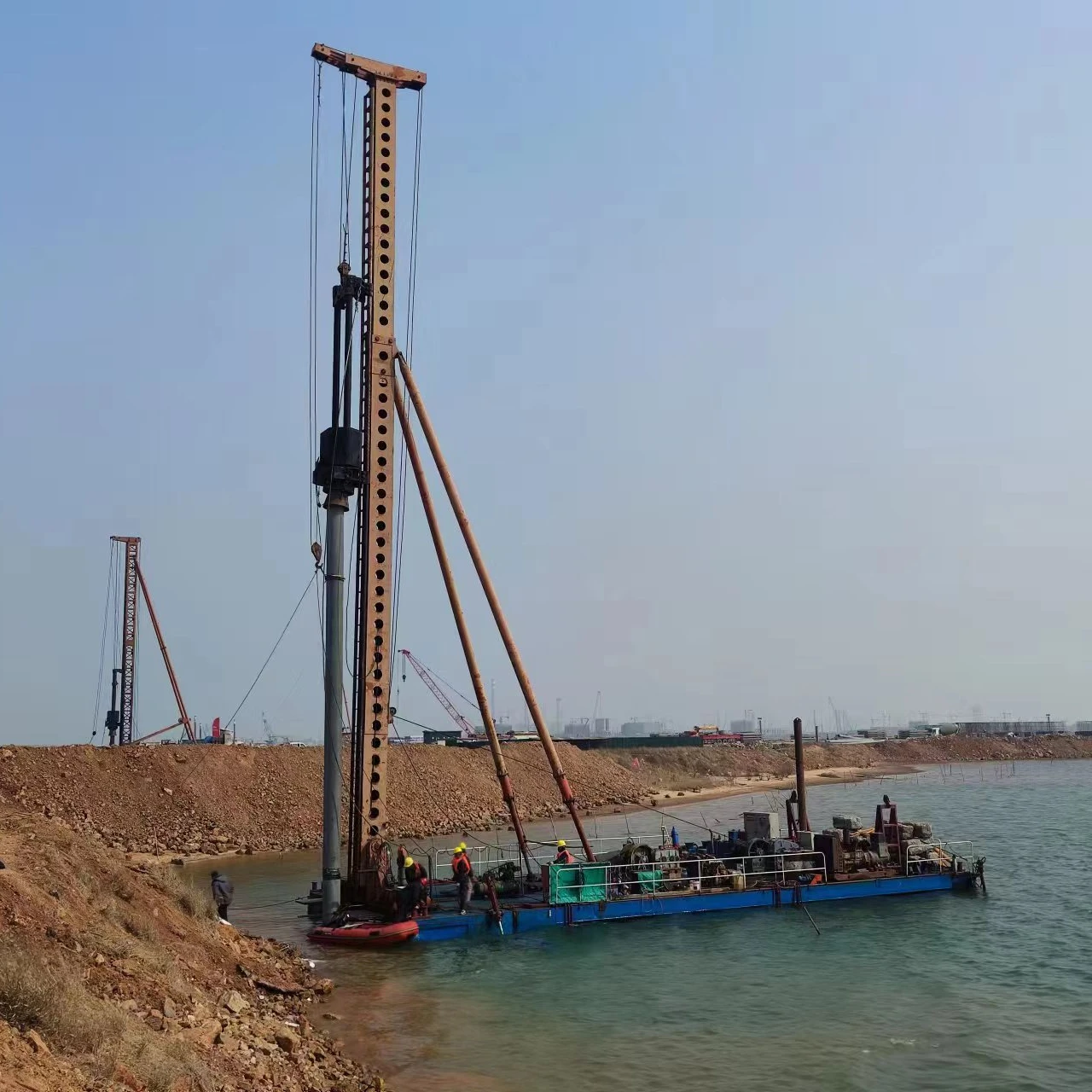 Barge platform for pile driver