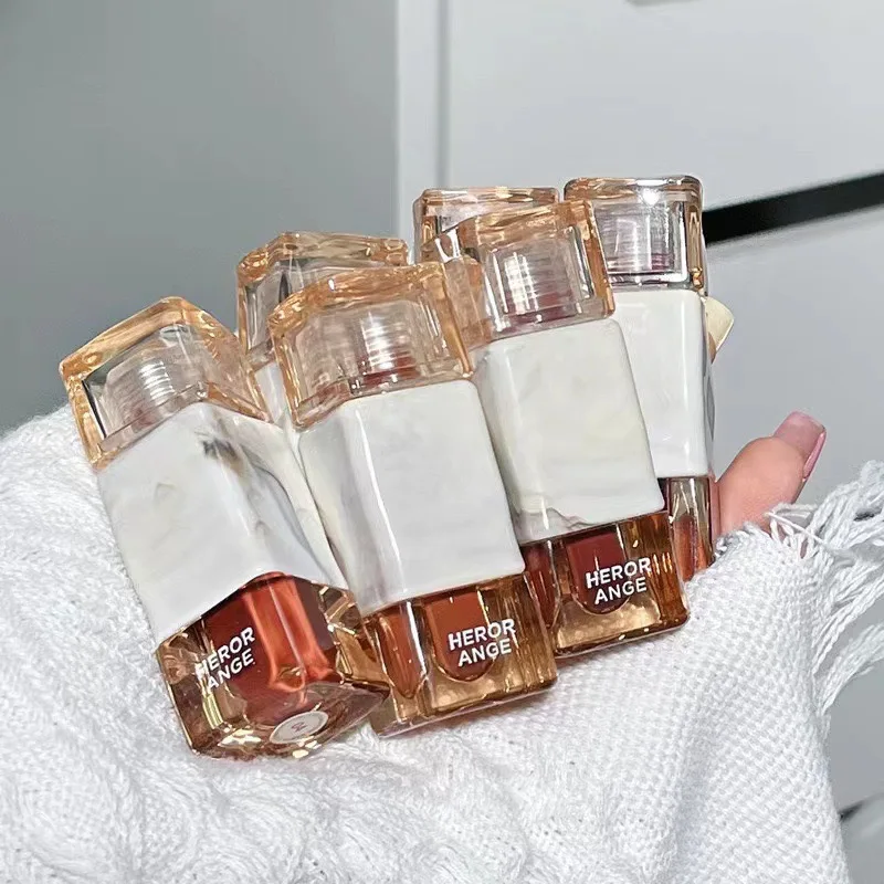 HERORANGE Light dew mirror lip glaze not easy to stick cup Thai milk coffee water light crystal jelly red lips gloss girl