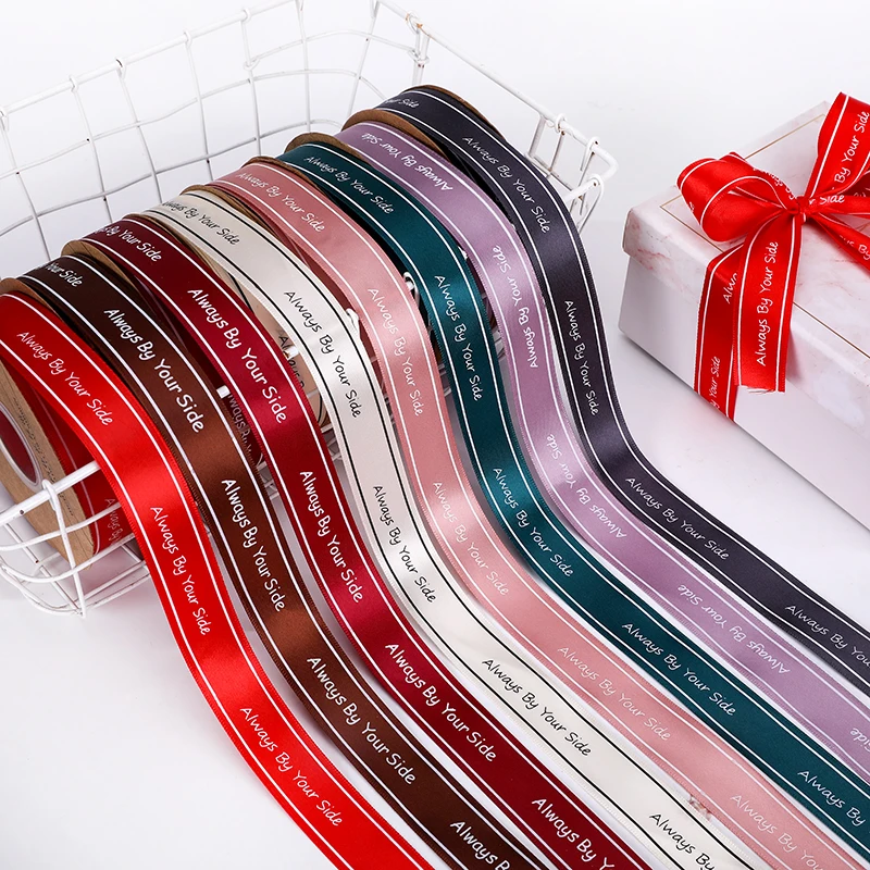 
2021 Custom Logo 3 D Logo 1 inch 25 MM Gold Foil Embossed Printed Polyester Satin Ribbon For Gift Wrapping 