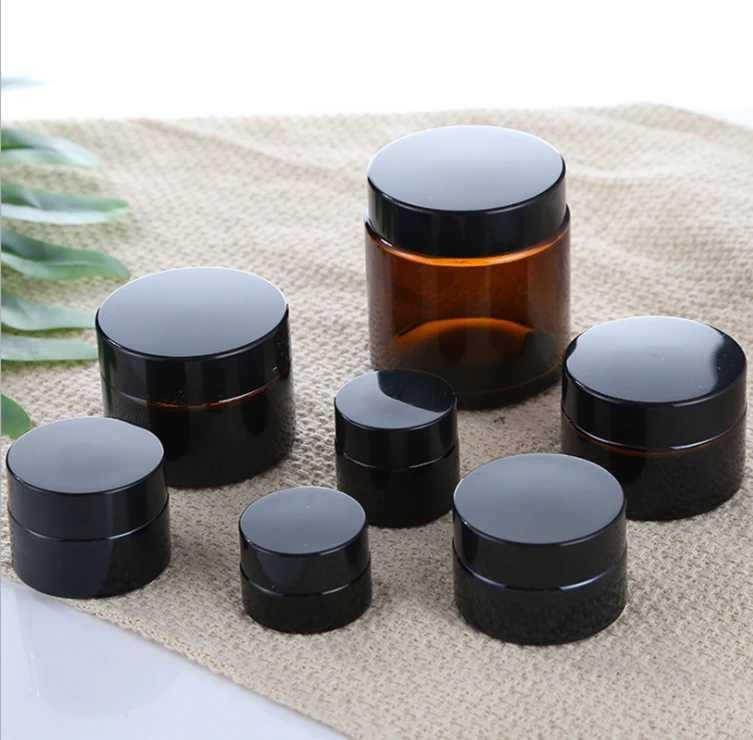 Wholesale reusable cosmetic packaging glass jar with lid amber cream jar