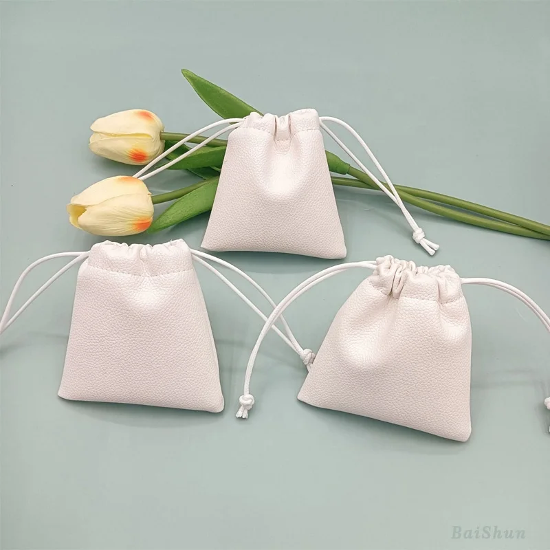 Hot Sale Custom Logo Emboss Pink Pu Leather Drawstring Bag Sunglasses Power Bank Waterproof Leather Pouch