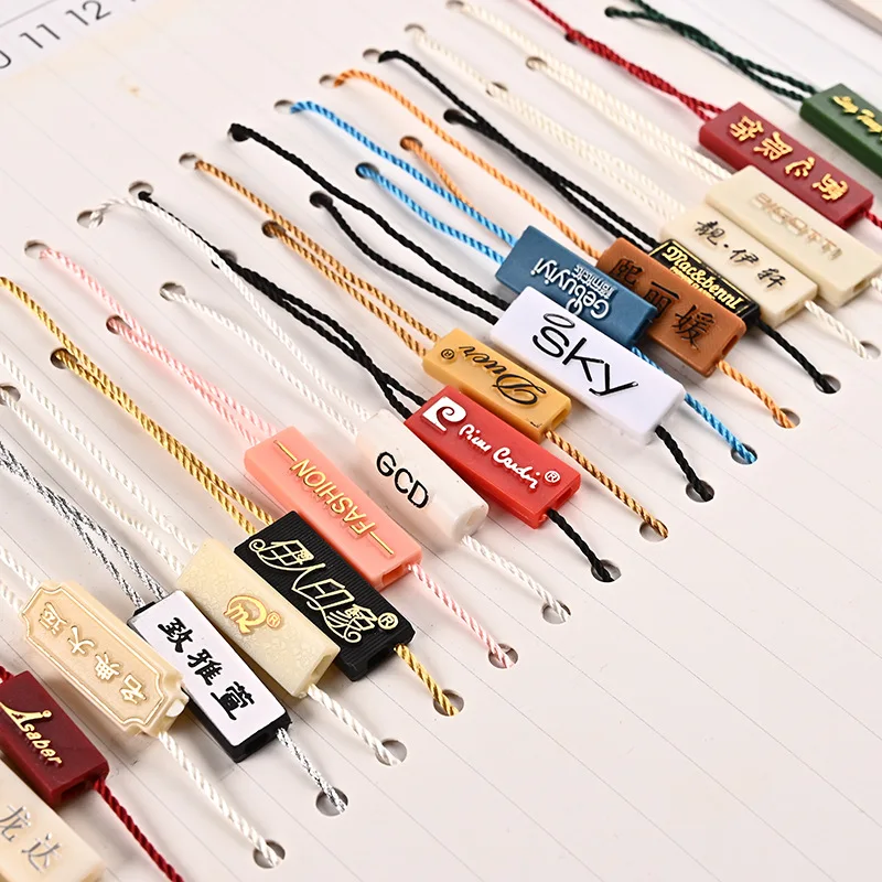 Plastic String Seal Lock Maker Personalized Design Embossed Seal Tags Custom Luxury Hang Tag Pvc Hang Tag Strings